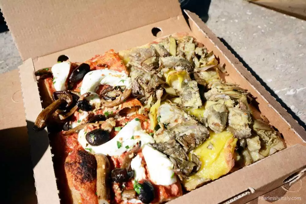 Image: Ordering food in Italian pizza al taglio.